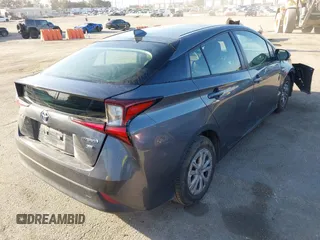 2022 Toyota Prius L Eco with VIN JTDKAMFUXN3188930, listed as a IAAI auction lot 42275661 with 116,934 mi miles and . Bid and sale history available at DreamBid. Image 4.