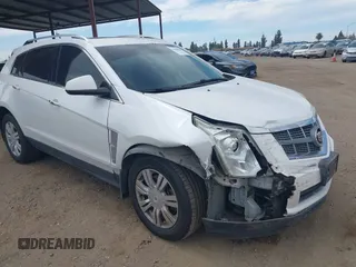 2012 Cadillac SRX Luxury Collection z VIN 3GYFNAE30CS589594, wystawiony jako IAAI lot #42000884 z przebiegiem 136 894 mil mil oraz . Historia ofert i sprzedaży dostępna na DreamBid. Obrazek 1.