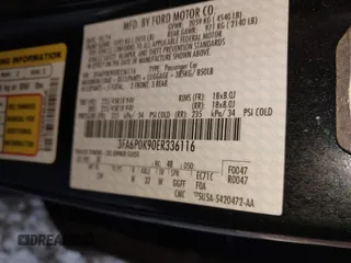 2014 Ford Fusion Titanium with VIN 3FA6P0K90ER336116, listed as a IAAI auction lot 41559792 with 132,852 mi miles. Bid and sale history available at carsss.com. Image 9.