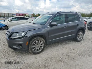 2013 Volkswagen Tiguan SE with VIN WVGAV3AX1DW601287, listed as a Copart auction lot 56116975 with 104,013 mi miles and Salvage title. Bid and sale history available at DreamBid. Image 1.