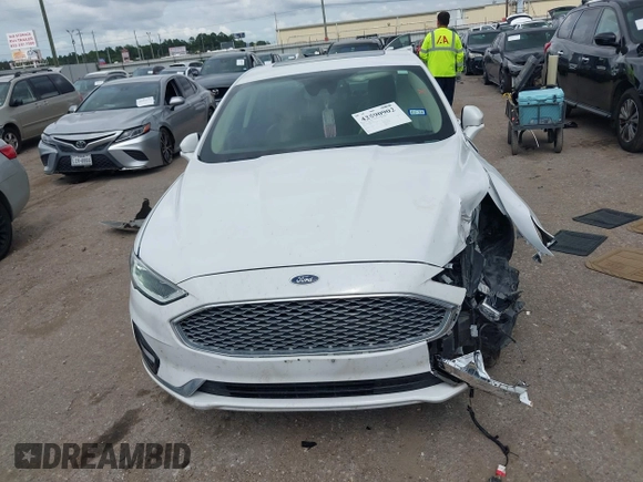 2020 Ford Fusion Titanium с VIN 3FA6P0D98LR151810, выставлен на аукционе IAAI как лот 42590902 с пробегом 76 624 миль миль и . История ставок и продаж доступна на DreamBid. Изображение 12.