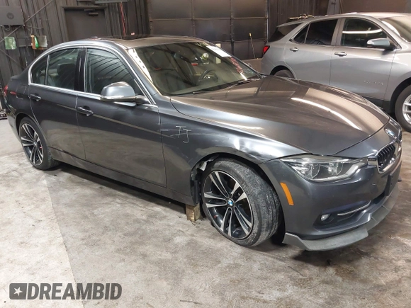 2018 BMW 3 Series 330i xDrive with VIN WBA8D9C51JEM34061, listed as a IAAI auction lot 42682318 with 65,245 mi miles and . Bid and sale history available at DreamBid. Image 1.