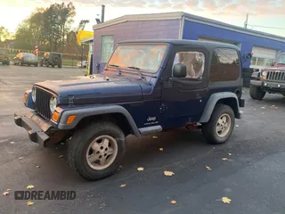 2003 Jeep Wrangler SE with VIN 1J4FA29143P371506, listed as a Copart auction lot 80153184 with 101,513 mi miles and Clean title. Bid and sale history available at DreamBid. Image 2.
