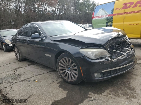 2012 BMW 7 Series 750i xDrive with VIN WBAKC6C52CC396443, listed as a Copart auction lot 44333945 with 134,075 mi miles and Salvage Title. Bid and sale history available at carsss.com. Image 4.
