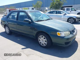 2001 Toyota Corolla CE with VIN 1NXBR12E71Z488933, listed as a IAAI auction lot 41527825 with 212,294 mi miles and . Bid and sale history available at DreamBid. Image 1.
