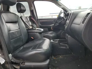 2004 Ford Escape Limited with VIN 1FMCU04134KA61949, listed as a Copart auction lot 47377455 with 205,480 mi miles and Salvage title. Bid and sale history available at DreamBid. Image 7.