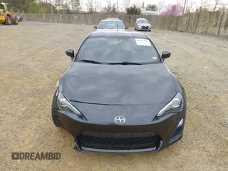2014 Scion FR-S with VIN JF1ZNAA12E8702261, listed as a IAAI auction lot 41971045 with 124,341 mi miles and . Bid and sale history available at DreamBid. Image 12.