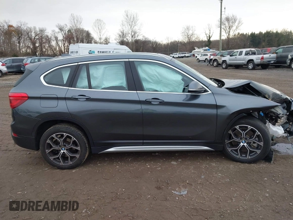 2021 BMW X1 xDrive28i with VIN WBXJG9C06M5S05303, listed as a IAAI auction lot 41060130 with 29,644 mi miles. Bid and sale history available at carsss.com. Image 14.
