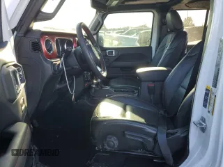 2022 Jeep Wrangler Unlimited Rubicon with VIN 1C4HJXFG6NW184670, listed as a Copart auction lot 84152964 with 31,459 mi miles and Salvage title. Bid and sale history available at DreamBid. Image 7.