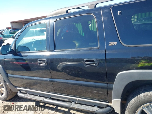 2002 Chevrolet Suburban Z71 with VIN 3GNFK16Z52G264577, listed as a IAAI auction lot 41581984 with 321,321 mi miles. Bid and sale history available at carsss.com. Image 14.