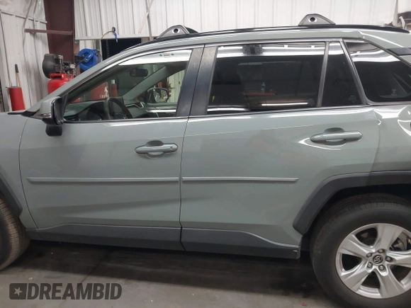 2019 Toyota RAV4 XLE with VIN JTMP1RFV2KD028137, listed as a IAAI auction lot 41931454 with 88,998 mi miles and . Bid and sale history available at DreamBid. Image 14.