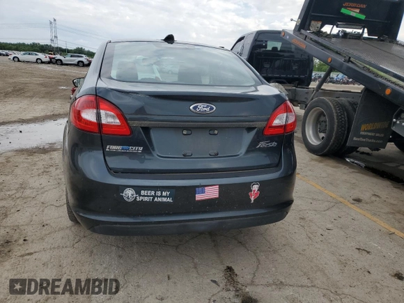 2011 Ford Fiesta S с VIN 3FADP4AJ3BM166904, выставлен на аукционе Copart как лот 58821805 с пробегом 30 981 миль миль и Списание • Salvage title. История ставок и продаж доступна на DreamBid. Изображение 6.