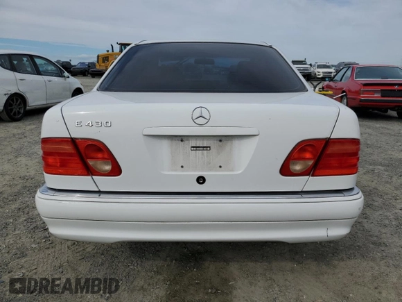 1998 Mercedes-Benz E with VIN WDBJF70F1WA683246, listed as a Copart auction lot 46858965 with Not Provided miles and Salvage Title. Bid and sale history available at DreamBid. Image 6.