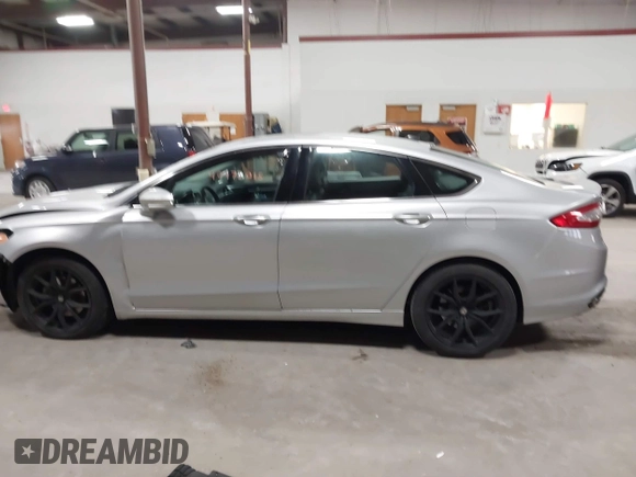 2015 Ford Fusion Titanium with VIN 3FA6P0D90FR201393, listed as a IAAI auction lot 40975015 with 131,641 mi miles. Bid and sale history available at carsss.com. Image 14.