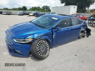2018 Ford Fusion Titanium with VIN 3FA6P0D97JR219690, listed as a Copart auction lot 63773595 with 138,066 mi miles and Salvage title. Bid and sale history available at DreamBid. Image 1.