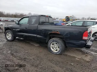 2001 Dodge Dakota Sport z VIN 1B7GL22N31S137577, wystawiony jako Copart lot #50119405 z przebiegiem Nie podano mil oraz Czysty tytuł • Clean title. Historia ofert i sprzedaży dostępna na DreamBid. Obrazek 2.