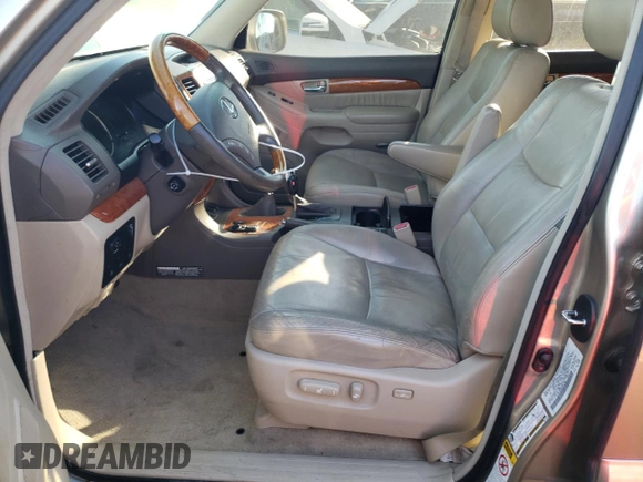 2005 Lexus GX 470 with VIN JTJBT20X450091562, listed as a Copart auction lot 77150944 with 192,023 mi miles and Clean Title. Bid and sale history available at DreamBid. Image 7.
