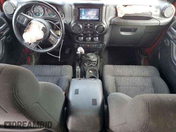 2012 Jeep Wrangler Unlimited Rubicon with VIN 1C4HJWFG2CL219021, listed as a Copart auction lot 87451784 with 109,675 mi miles and Salvage title. Bid and sale history available at DreamBid. Image 8.