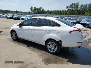2019 Ford Fiesta SE z VIN 3FADP4BJ2KM147288, wystawiony jako Copart lot #55391125 z przebiegiem 83 887 mil mil oraz Szkoda całkowita • Salvage title. Historia ofert i sprzedaży dostępna na DreamBid. Obrazek 2.