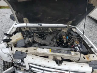 2002 Ford Ranger XL Fleet with VIN 1FTYR44U82TA21001, listed as a Copart auction lot 58392305 with 234,824 mi miles and Salvage title. Bid and sale history available at DreamBid. Image 11.