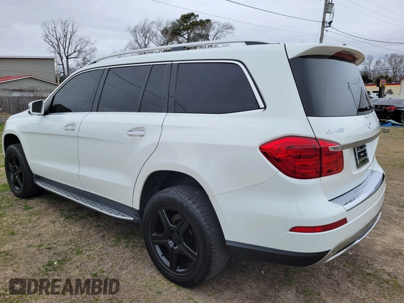 2015 Mercedes-Benz GL-Class GL 450 with VIN 4JGDF6EE2FA517080, listed as a IAAI auction lot 41640032 with 136,625 mi miles. Bid and sale history available at carsss.com. Image 4.