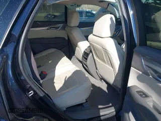 2021 Cadillac XT5 FWD Premium Luxury z VIN 1GYKNCRS2MZ141440, wystawiony jako IAAI lot #41874409 z przebiegiem 76 911 mil mil oraz . Historia ofert i sprzedaży dostępna na DreamBid. Obrazek 8.