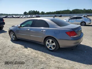 2006 Acura RL z VIN JH4KB16576C005794, wystawiony jako Copart lot #55167965 z przebiegiem 157 104 mil mil oraz Szkoda całkowita • Salvage title. Historia ofert i sprzedaży dostępna na DreamBid. Obrazek 2.