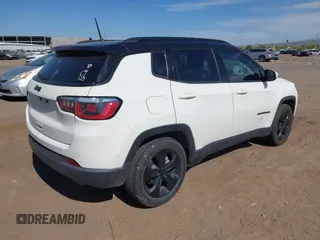 2018 Jeep Compass Latitude with VIN 3C4NJCBB3JT462141, listed as a IAAI auction lot 42024920 with 84,988 mi miles and . Bid and sale history available at DreamBid. Image 4.