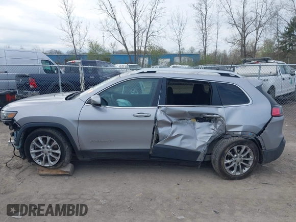 2019 Jeep Cherokee Latitude with VIN 1C4PJLCB6KD159997, listed as a IAAI auction lot 42102904 with 72,064 mi miles and . Bid and sale history available at carsss.com. Image 14.