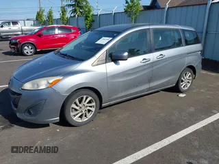 2012 Mazda 5 Sport z VIN JM1CW2BL3C0115906, wystawiony jako IAAI lot #42062899 z przebiegiem 124 286 mil mil oraz . Historia ofert i sprzedaży dostępna na DreamBid. Obrazek 2.
