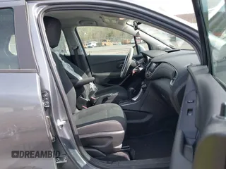 2020 Chevrolet Trax LS with VIN 3GNCJKSB2LL326823, listed as a IAAI auction lot 42103386 with 33,241 mi miles and . Bid and sale history available at carsss.com. Image 5.