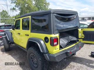 2023 Jeep Wrangler Sport with VIN 1C4HJXDG5PW693865, listed as a IAAI auction lot 40068881 with 12,149 mi miles and . Bid and sale history available at DreamBid. Image 3.