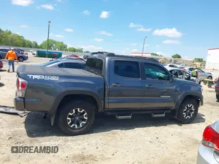 2023 Toyota Tacoma SR with VIN 3TMCZ5AN9PM553246, listed as a IAAI auction lot 42201812 with 20,907 mi miles and . Bid and sale history available at DreamBid. Image 14.