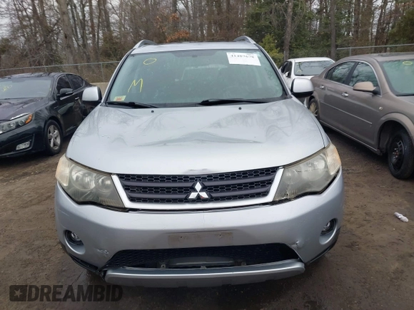2009 Mitsubishi Outlander SE z VIN JA4MT31W89Z003101, wystawiony jako IAAI lot #41487678 z przebiegiem 90 226 mil mil oraz . Historia ofert i sprzedaży dostępna na DreamBid. Obrazek 12.