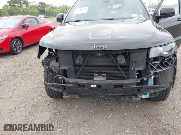 2016 Jeep Grand Cherokee Laredo z VIN 1C4RJFAG6GC475857, wystawiony jako IAAI lot #42311448 z przebiegiem 106 472 mil mil oraz . Historia ofert i sprzedaży dostępna na DreamBid. Obrazek 6.