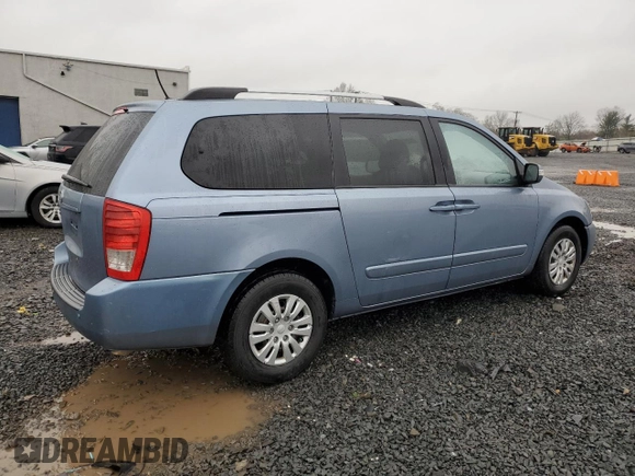 2012 Kia Sedona LX with VIN KNDMG4C70C6465733, listed as a Copart auction lot 52017215 with 149,800 mi miles and Salvage Title. Bid and sale history available at carsss.com. Image 3.