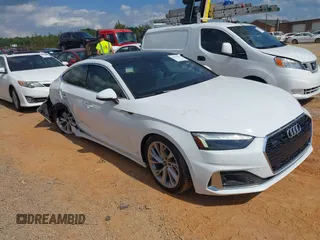 2023 Audi A5 Sportback Premium z VIN WAUABCF57PA020461, wystawiony jako IAAI lot #42230307 z przebiegiem 28 983 mil mil oraz . Historia ofert i sprzedaży dostępna na DreamBid. Obrazek 1.