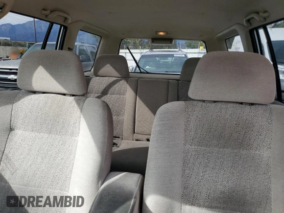 1999 Mitsubishi Montero LS z VIN JA4LS31H2XP037110, wystawiony jako Copart lot #45447485 z przebiegiem 166 942 mil mil oraz Szkoda całkowita • Salvage title. Historia ofert i sprzedaży dostępna na DreamBid. Obrazek 10.