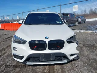 2019 BMW X1 xDrive28i with VIN WBXHT3C58K5N05523, listed as a IAAI auction lot 41752675 with 63,861 mi miles. Bid and sale history available at carsss.com. Image 12.