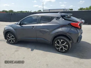 2022 Toyota C-HR XLE z VIN NMTKHMBX2NR140945, wystawiony jako Copart lot #58809375 z przebiegiem 56 161 mil mil oraz Nie do naprawy • Non repairable. Historia ofert i sprzedaży dostępna na DreamBid. Obrazek 2.