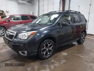 2014 Subaru Forester 2.0XT Touring with VIN JF2SJGPC7EH425711, listed as a IAAI auction lot 41549382 with 119,039 mi miles. Bid and sale history available at carsss.com. Image 2.