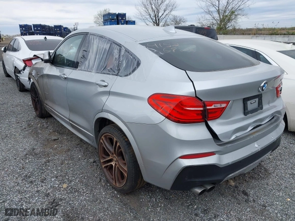 2016 BMW X4 xDrive28i with VIN 5UXXW3C55G0R20074, listed as a IAAI auction lot 42067204 with 91,169 mi miles. Bid and sale history available at carsss.com. Image 3.