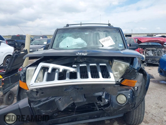 2008 Jeep Commander Sport with VIN 1J8HH48KX8C167462, listed as a IAAI auction lot 42075211 with 183,981 mi miles and . Bid and sale history available at DreamBid. Image 12.