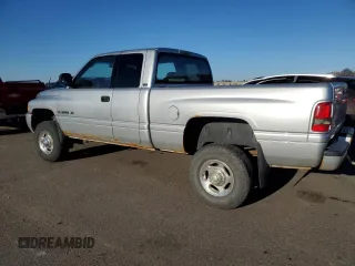 2001 Dodge Ram 2500 with VIN 3B7KF23Z31G821023, listed as a Copart auction lot 82185604 with 77,364 mi miles and Clean Title. Bid and sale history available at carsss.com. Image 2.