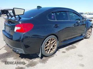 2015 Subaru WRX Limited with VIN JF1VA1G67F8809515, listed as a IAAI auction lot 42003173 with 112,414 mi miles. Bid and sale history available at carsss.com. Image 4.