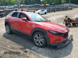 2023 Mazda CX-30 S Premium with VIN 3MVDMBDM2PM577052, listed as a Copart auction lot 59625945 with Not provided miles and Salvage title. Bid and sale history available at DreamBid. Image 4.