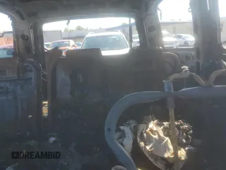 2003 Chevrolet Tahoe LS z VIN 1GNEC13Z03J273863, wystawiony jako Copart lot #56574255 z przebiegiem Nie podano mil oraz Szkoda całkowita • Salvage title. Historia ofert i sprzedaży dostępna na DreamBid. Obrazek 10.