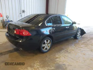 2007 Kia Optima EX with VIN KNAGE124875134352, listed as a IAAI auction lot 41627381 with 183,053 mi miles. Bid and sale history available at carsss.com. Image 4.