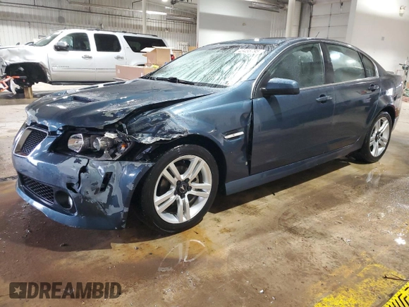 2009 Pontiac G8 with VIN 6G2ER57789L161792, listed as a Copart auction lot 43455795 with 127,236 mi miles and Salvage Title. Bid and sale history available at DreamBid. Image 1.