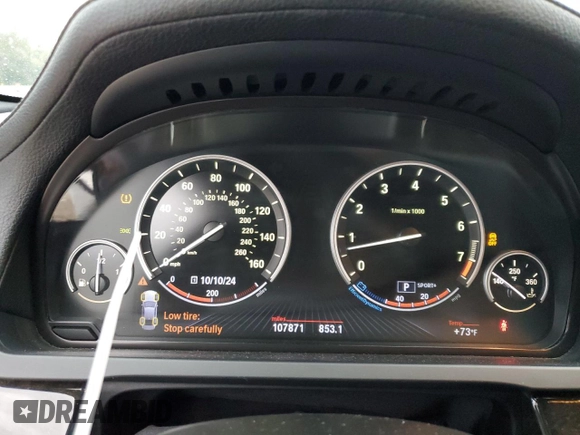 2013 BMW 7 Series 750i with VIN WBAYA8C54DC996569, listed as a Copart auction lot 74199774 with 107,871 mi miles and Salvage Title. Bid and sale history available at DreamBid. Image 9.